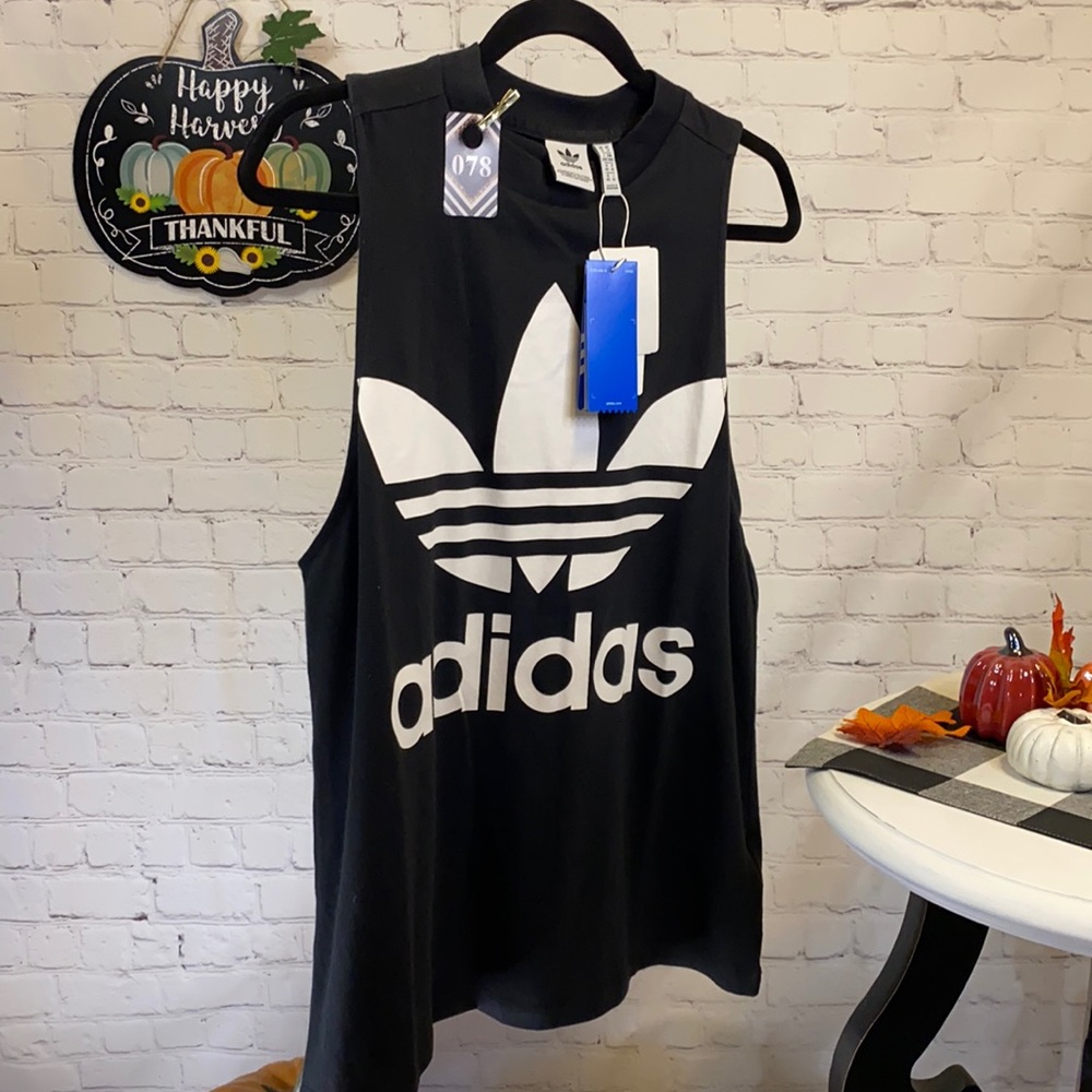Adidas muscle shirt. Tank top with a yoked back.